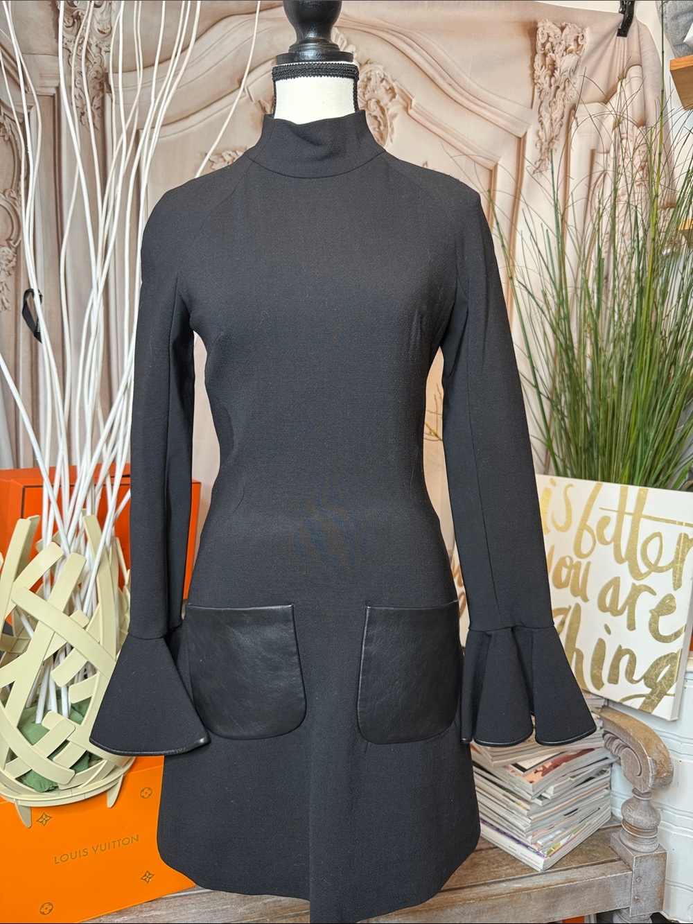 Black Long-Sleeve Mini Dress with Flared Cuffs and Front Patch Pockets